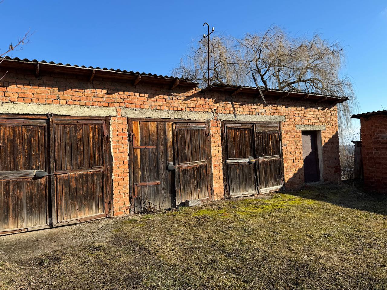 Гараж літ. Е